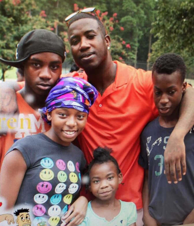 Gucci mane rare picture with his children.
